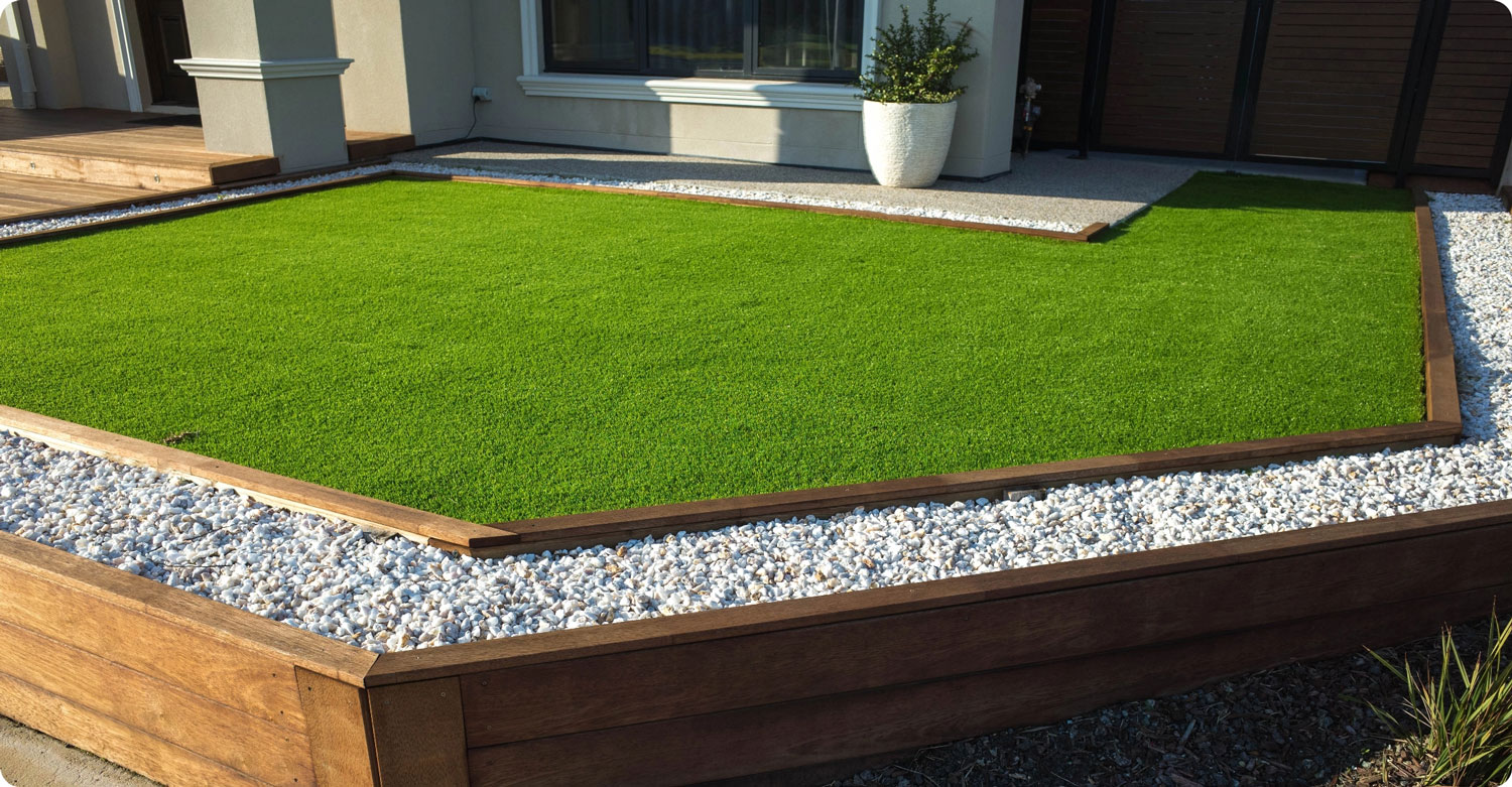 A residential lawn with artificial grass.